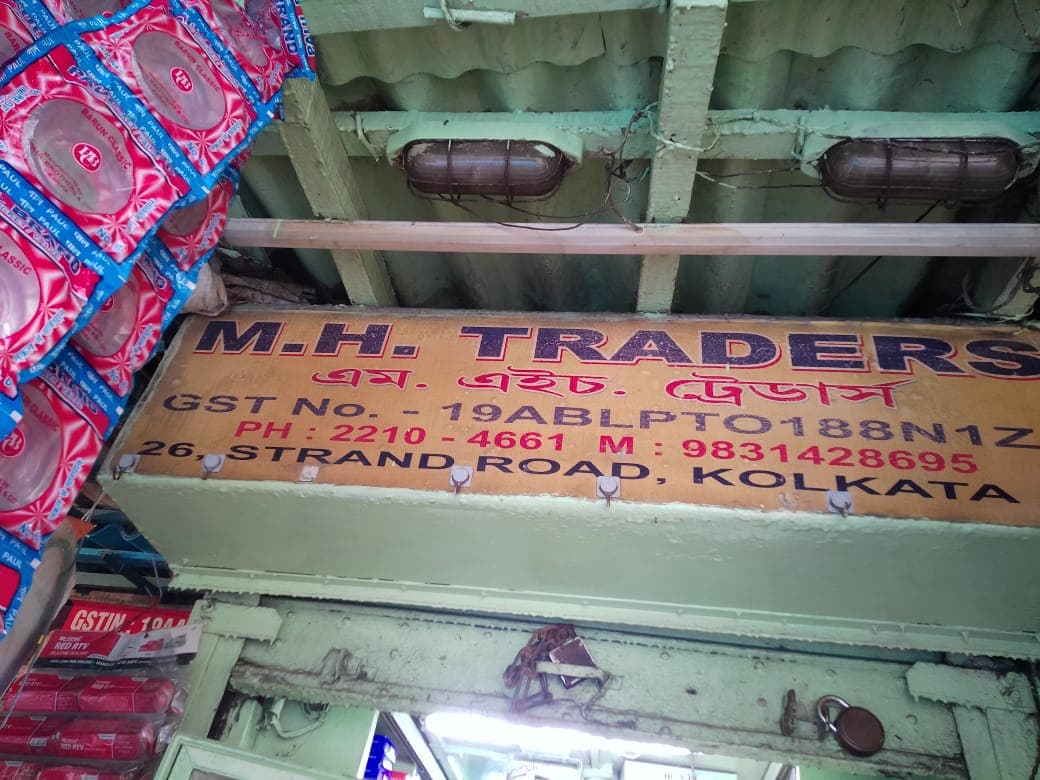 M. H. Traders godown and warehouse sign