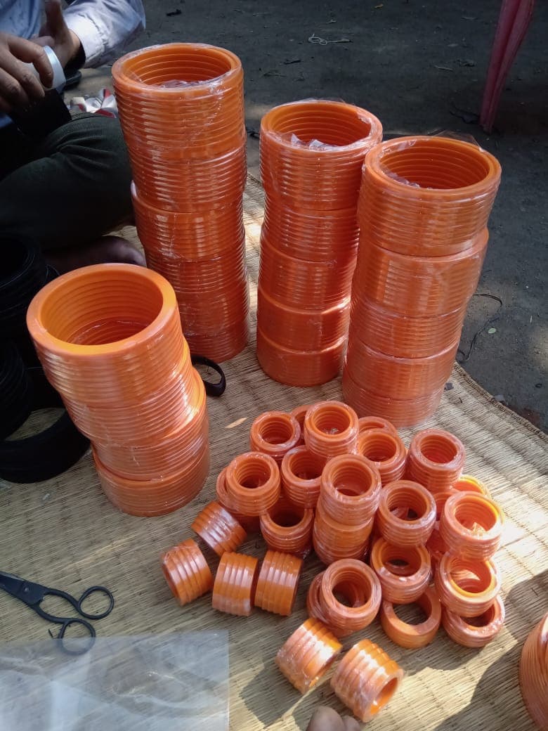 Polyurethane elevator buckets stacked in stock